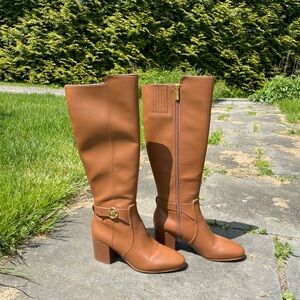 Like new MK boots with heel.